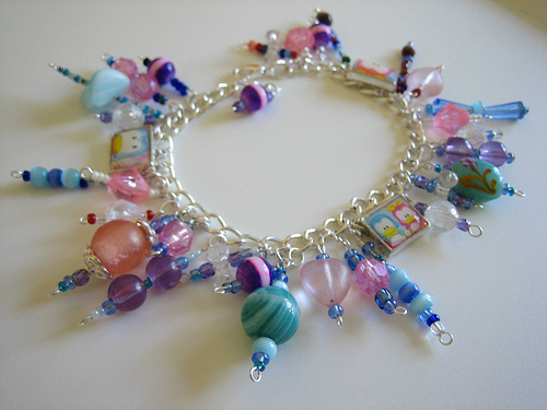 A very kitsch bracelet with colourful plastic bits.